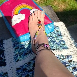 NWOT rainbow barefoot sandals